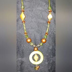 Green and copper tone bead necklace